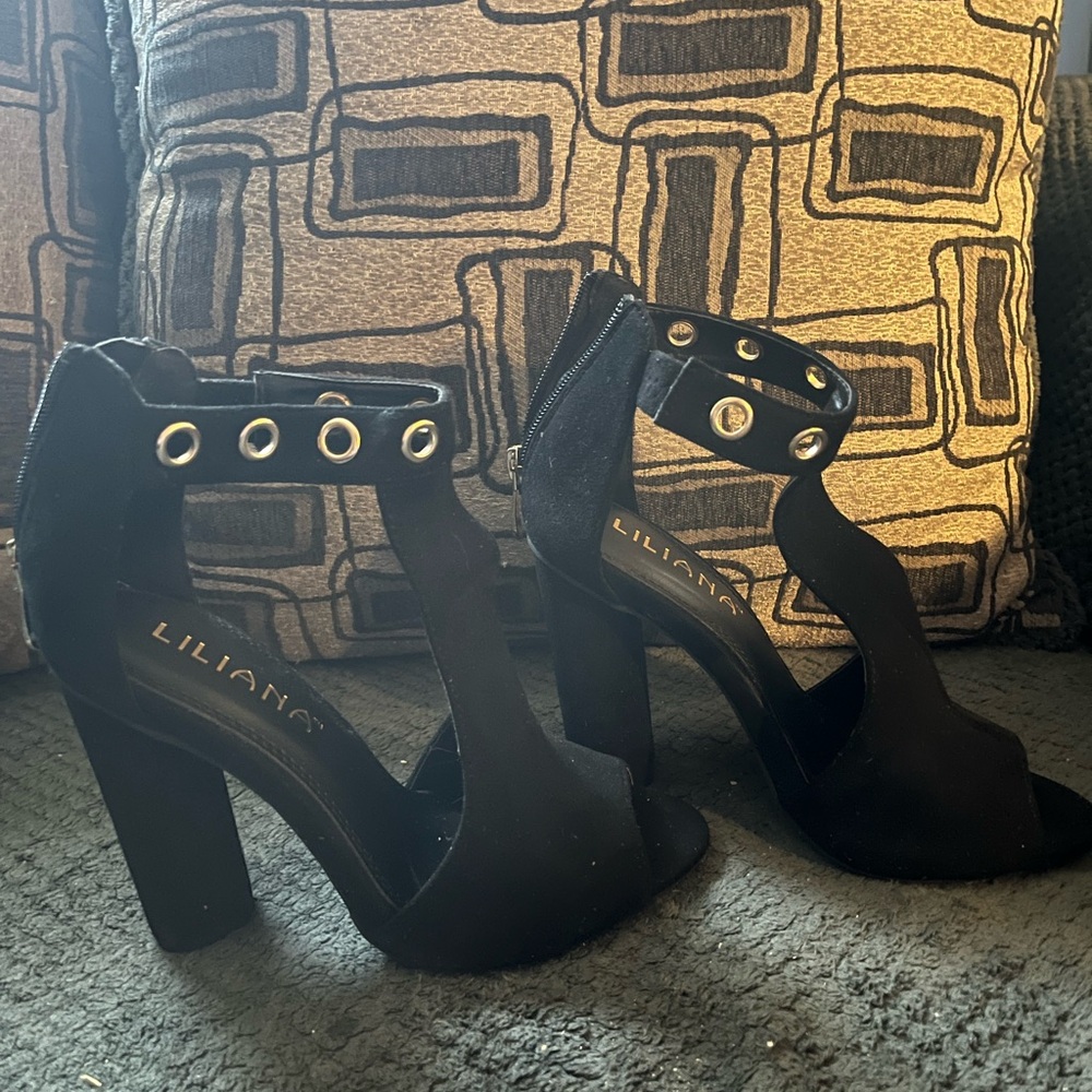 Black suede high heeled toe shoes